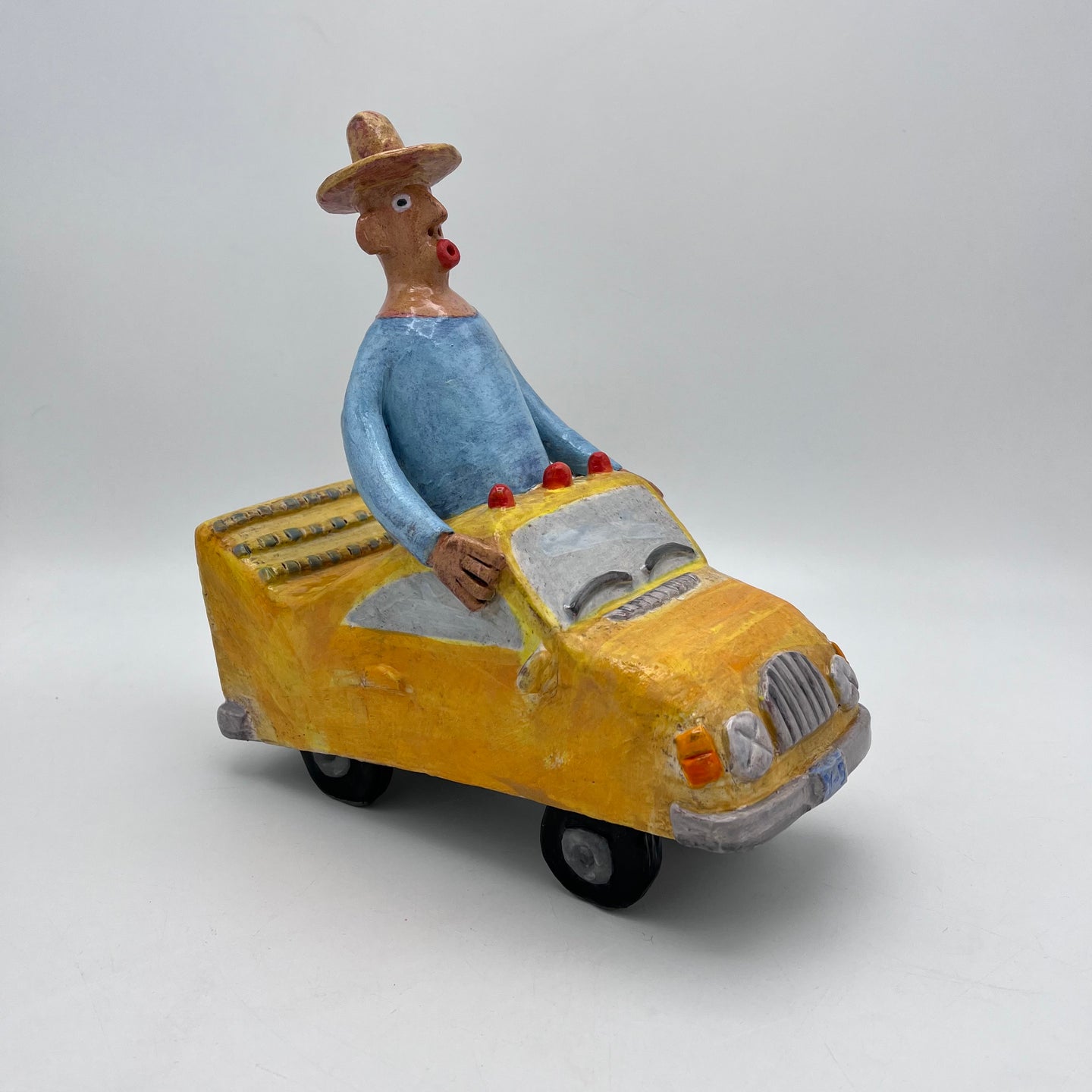 103. yellow car man