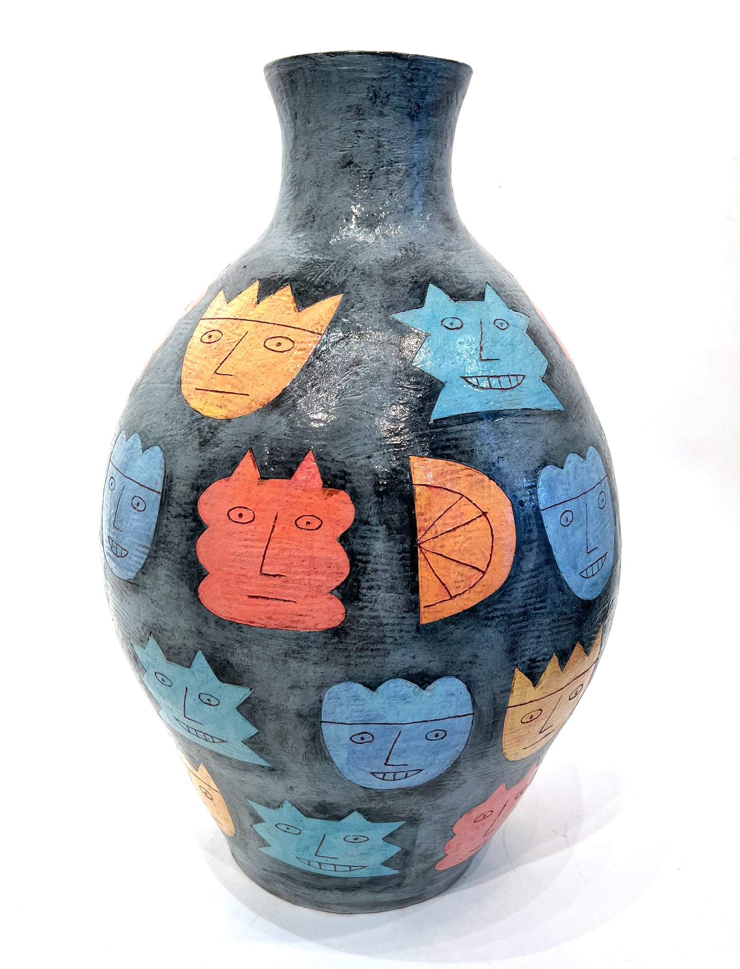 151. Faces & Orange Vase