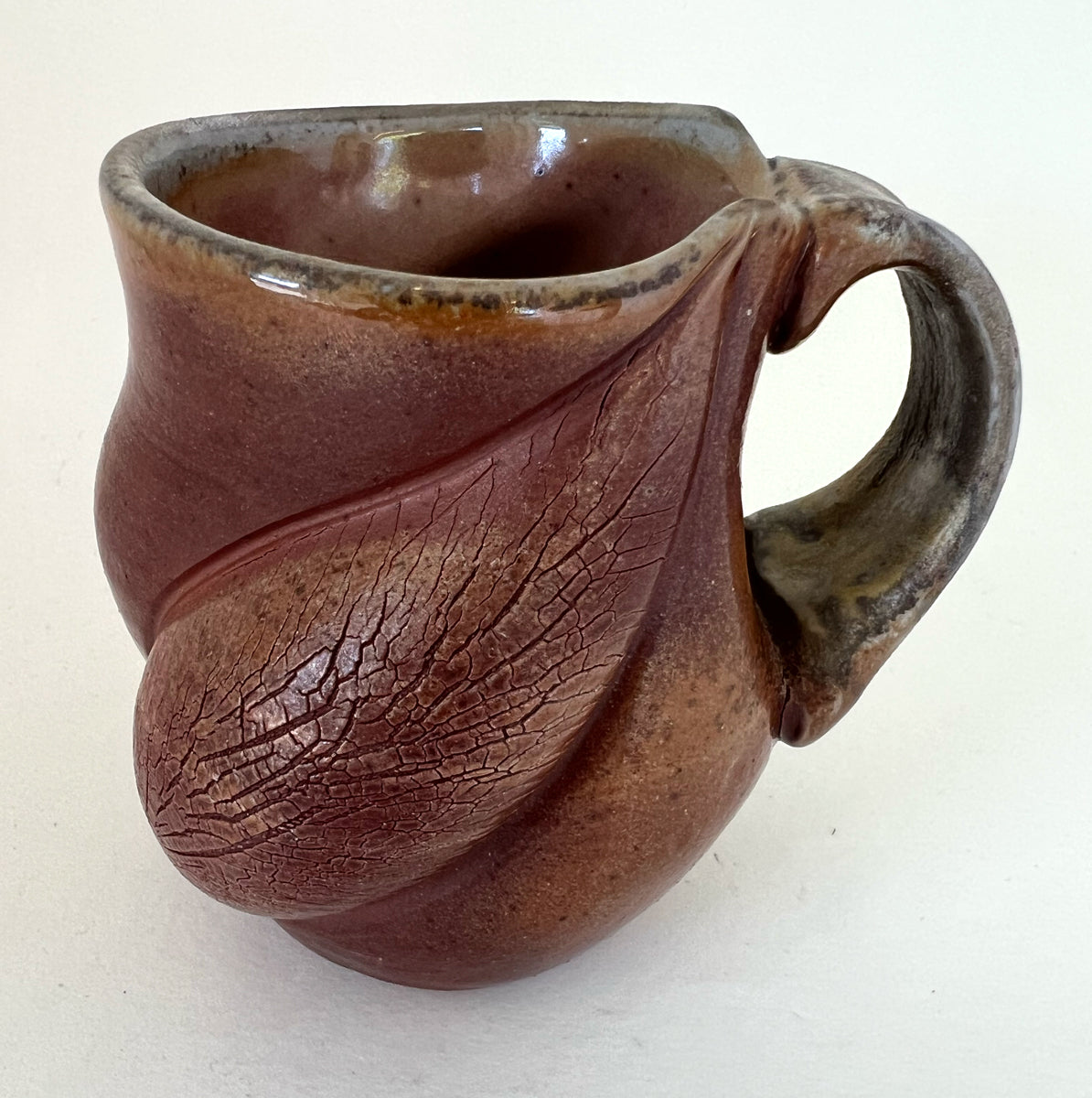 28. Soda Fired Venus Mug
