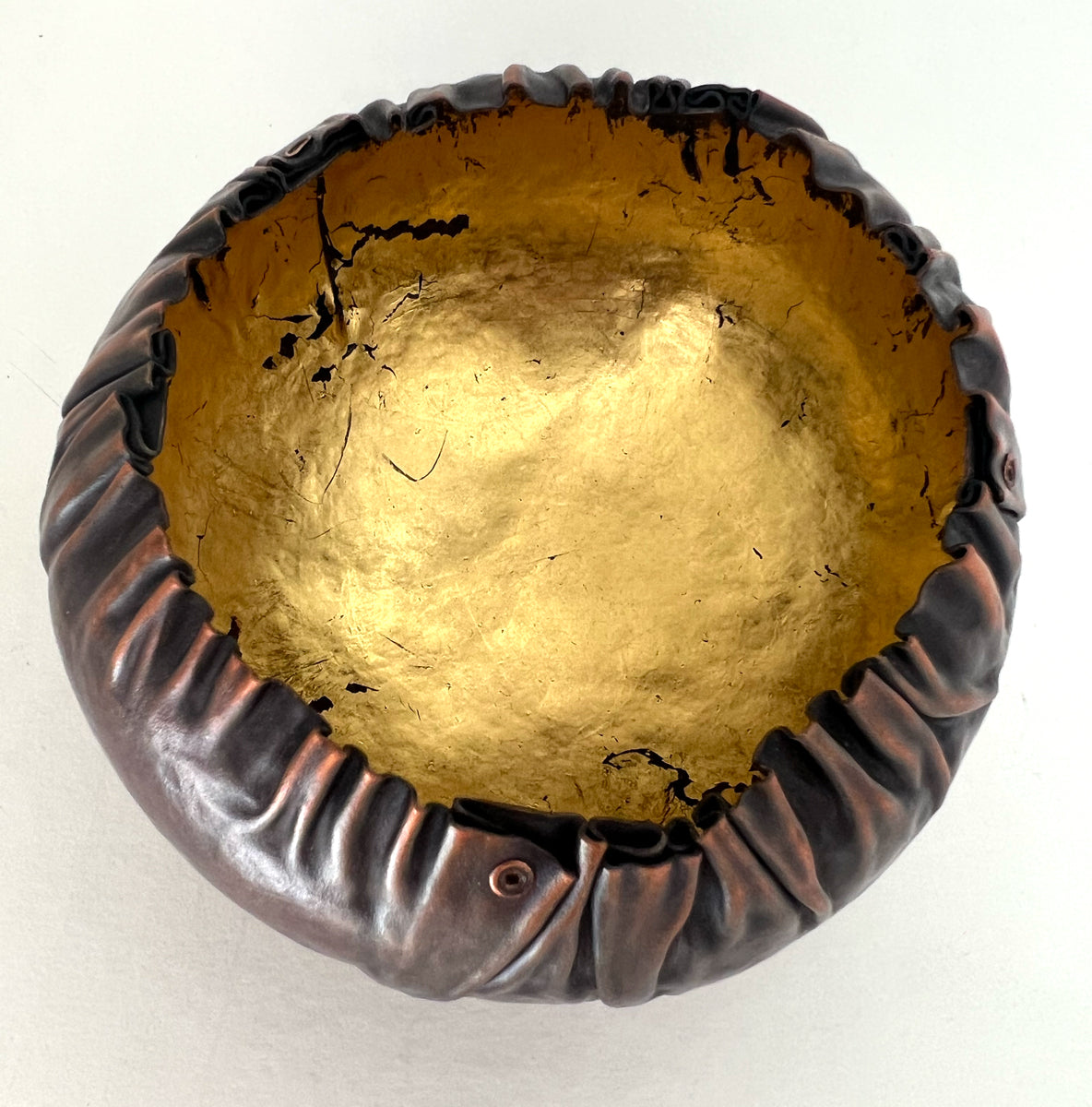 33. Raised Copper Bowl