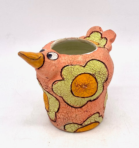 397. Coral Bird Vase w/lime flowers