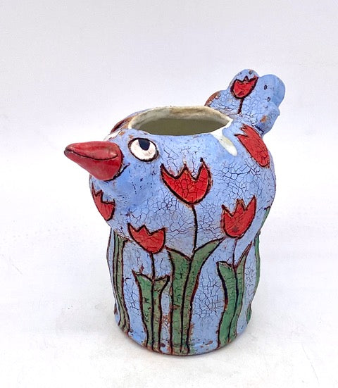 398. Baby Blue Bird Vase w/ red flowers