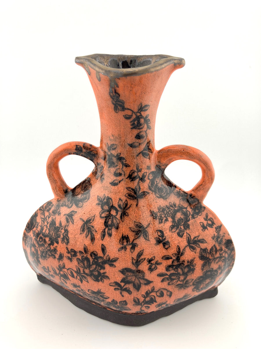 87. Bud Vase E2 (ceramic, coral w/ black flowers)