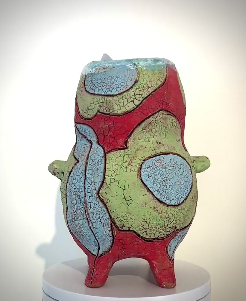 391. Red Vase w/lime flowers, knob handles, legs
