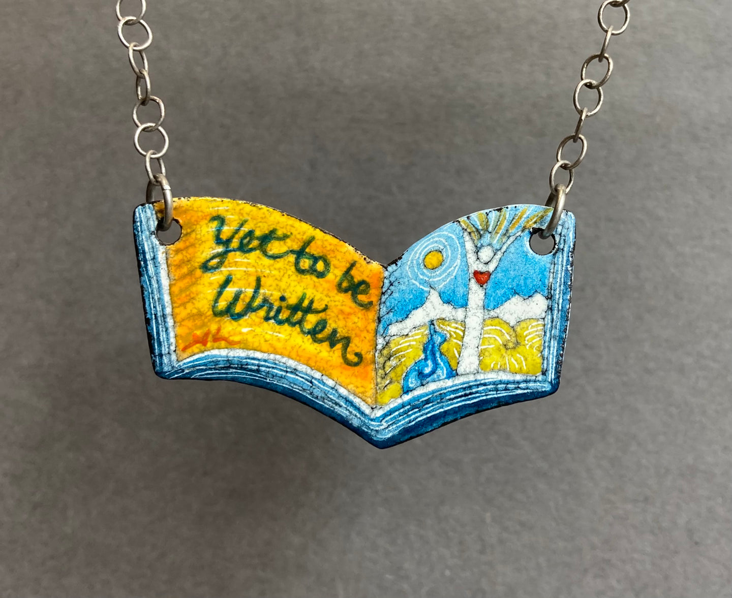 105. Yet to be Written (book) Pendant
