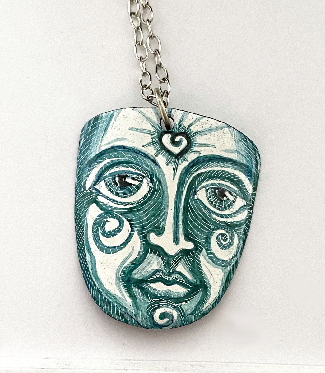 6. Buddha Face Enamel Pendant